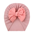 Pink newborn turban hat with oversized waffle texture bow on a plain knit fabric - Dusky Pink