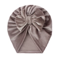 Detail of soft velvet baby hat with large decorative bow in dusty rose color - One Size / Gray