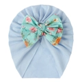 Detail of baby turban hat with a mint green floral print bow and blue ribbed knit fabric - Cyan