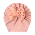 Pink ribbed newborn turban hat with a large gold polka dot bow detail for baby girls - Flesh Pink