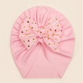 Soft pink ribbed knit baby beanie with a large gold polka dot tulle bow accent - Pink