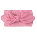 Close-up of pink soft nylon baby turban headband with large bunny ear bow detail - Pink