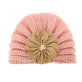 Detailed shot of baby knit hat featuring a large fabric flower and white pearl beads - One Size / Dusty Pink and Light Coffee