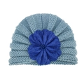 Detailed view of baby turban hat with light blue knit and navy blue fabric flower - One Size / Light Blue and Royal Blue