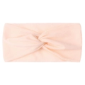 Detail of soft peach knotted nylon headband with tidy stitching for baby girls - Nude Pink