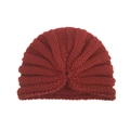 Detail of burgundy ribbed knit turban hat featuring a central knot design for infants - Burgundy