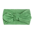 Detail view of grass green baby turban with a soft knit fabric and knotted bunny ear bow - Green