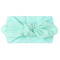 Diadema de nylon verde menta para bebé con un lazo grande decorativo para niños - Verde menta