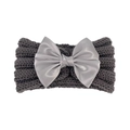 Detailed texture of charcoal knit baby headband with silver satin bow on white background - Gray