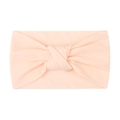 Soft apricot nylon knotted headband for babies with a flexible double-layered fabric design - Nude Pink