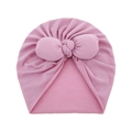 Close-up of pink cotton infant hat featuring a large decorative bow and pleated texture - One Size / Dusky Pink