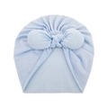 Detail of light blue baby turban hat with a large knot, soft knit fabric texture closeup - One Size / Light Blue