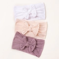 Dettaglio della trama in maglia di 3 fasce per neonati in nylon dai colori neutri - Bianco Rosa Chiaro Viola Taro
