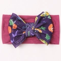 Magenta nylon baby headband with purple knit pumpkin pattern bow for Halloween - Deep purple
