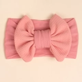 Detailansicht der weichen rosa Waffelstruktur und Schleife am Nylon Baby Stirnband - Altrosa