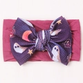 Deep purple Halloween baby headband featuring ghosts and pumpkin patterns on a large bow - Fuschia