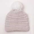 Chunky knit baby beanie in cream white with a fluffy white faux fur pom-pom - Beige