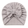 Light grey baby turban hat with a large decorative bow and soft cable knit texture - Gray