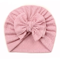 Baby girl pink cable knit turban hat with a large decorative bow on white background - Flesh Pink