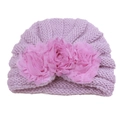 Detail of purple knitted baby hat featuring three 3D pink fabric flowers and lace mesh - Purple