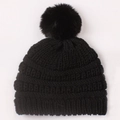 Classic black knitted baby beanie with a fluffy faux fur pompom for winter warmth - Black