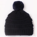 Navy blue knitted baby beanie with fuzzy pom-pom and warm ribbed texture - Navy Blue