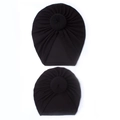 Close-up of black knitted donut turbans in large and small sizes for mother and baby - Black
