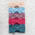 Lot de 5 bandeaux bébé en nylon souple avec nœuds papillon et texture tricotée torsadée - Rose Poudré-Bleu-Violet Taro-Rouge Rose-Bleu Marine