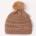 Knitted baby winter hat in camel brown featuring a fluffy faux fur pom-pom detail - Coffee