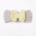 Winter baby headband featuring a beige knitted band and soft pale yellow nylon bow detail - Beige