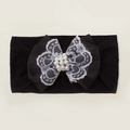 Détail d'un bandeau pour bébé en nylon noir avec nœud en dentelle et perles - Noir