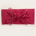 Detail of red elastic baby headband with large shimmering sequined mesh bow accessory - Burgundy
