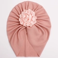 Pink ribbed baby turban hat with a large satin rose flower decoration for infants - Flesh Pink