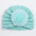 Cozy mint green ribbed knit baby beanie with a fluffy faux fur pompom for winter - Mint Green