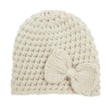 Détail du bonnet en maille pour bébé de couleur crème avec texture épaisse et gros nœud - Hauts / Beige
