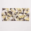 Detail of soft ribbed baby headband with floral print and elegant 3D central bow - White with Yellow-Brown Large Floral Style (G)
