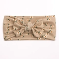 Detail of baby headband featuring soft ribbed beige fabric with daisy floral prints - Beige-Brown with White Daisy Style (H)