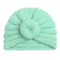 Detailed close-up showing the vertical knit texture and soft mint green newborn turban hat - Mint Green