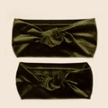 Detail of soft olive green velvet knotted headbands in a parent-child matching set - Dark Green