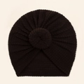Detail of baby winter turban hat with waffle texture and large donut knot in dark brown - Black