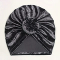 Detail showing the soft texture and donut knot of the dark grey velvet baby turban hat - Dark Gray