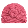 Detailed texture of dark pink infant knit turban hat with central donut knot decoration - Dusky Pink