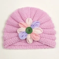 Pink knit baby turban hat with colorful fabric flower and green button detail - Pink