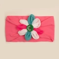 Dettaglio fascia per neonati in nylon morbido con fiore in tessuto colorato e bottone - Rosso rosa