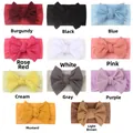 Dettaglio di 11 fasce per neonati in nylon colorato con fiocco morbido a nido d'ape - 11 Colori Assortiti