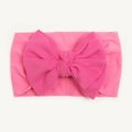 Detailed close-up of rose red baby nylon headband with soft large handmade bow knot - Rose Red
