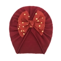 Dettaglio del cappello turban per neonato rosso vino con fiocco in tulle a pois dorati - Taglia unica / Borgogna