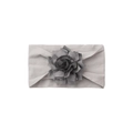 Close-up of soft light grey baby headband featuring a detailed dark grey handmade fabric flower - Gray