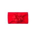 Detail of red baby headband featuring a large soft layered fabric flower on top - Red