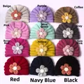 Rasteranzeige von Baby-Strickmützen in 12 Farben wie Beige, Rosa und Marineblau - 12 Farben Gemischt